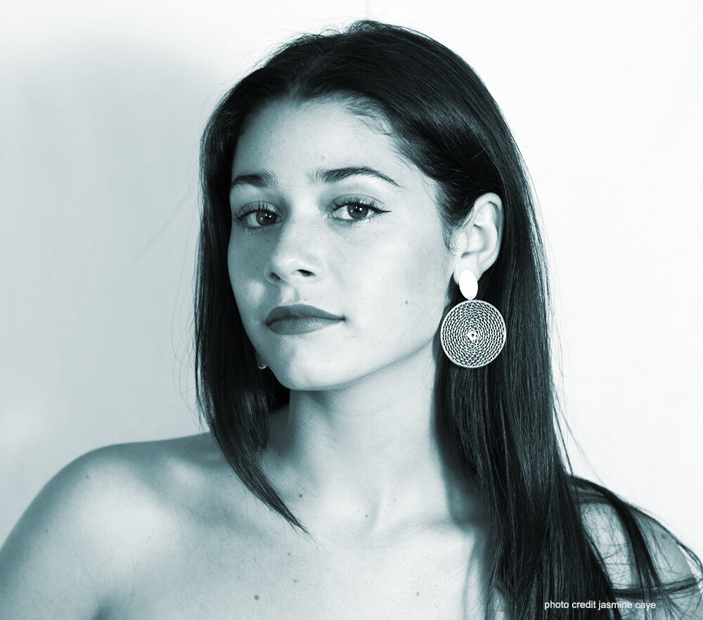 AZURE, singer and songwriter, artist headshot in blue tint.